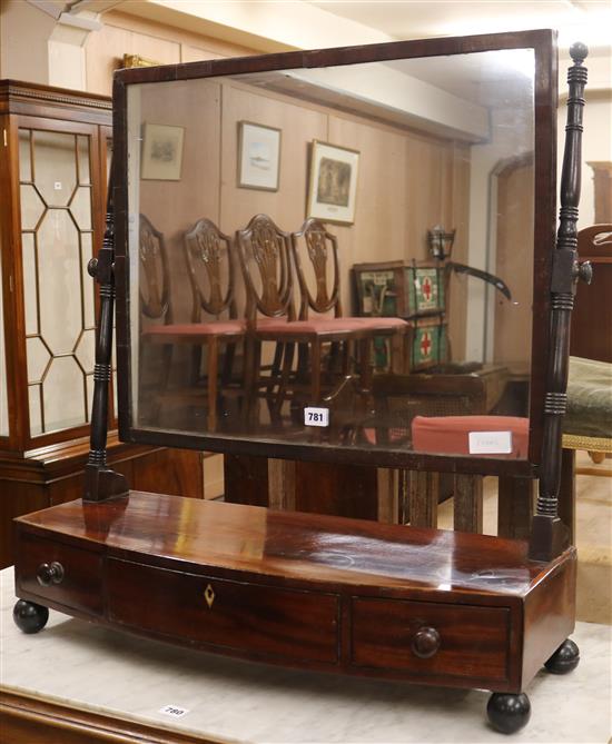 A Regency bowfronted mahogany toilet mirror W.70cm